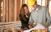 Woman Advising Building Contractor