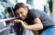 Man Admiring a Car
