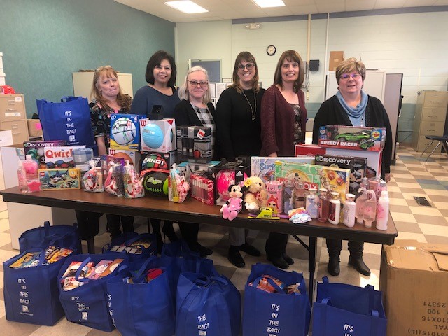 Table full of donated collections at East Toledo branch