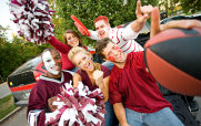 Young People Tailgating at a Football Game